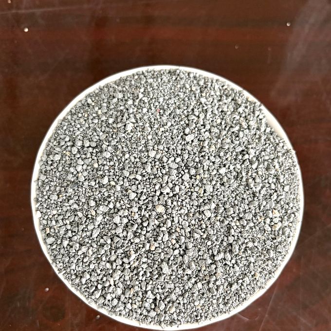 Grey mineral granule